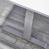 Höhenverstellbares Gestell des elektrischen Schreibtischs XDKB 19 G mit T-Fuß auf grauem Boden von hjh OFFICE PRO